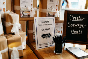 ELEMIS sponsor sign featured at a Mavely meetup in Denver, September 2024.